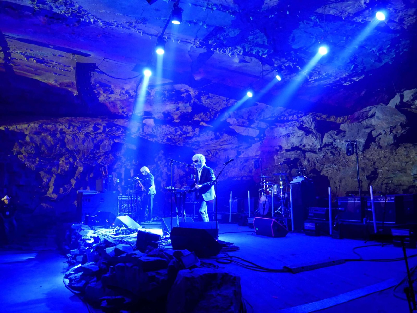 drab majesty band playing on stage in the caverns