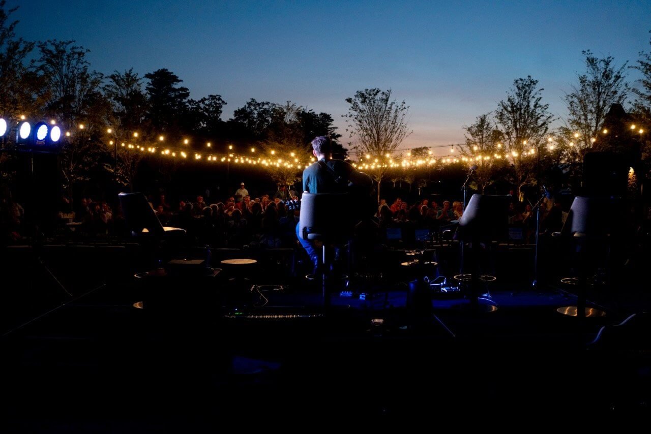 artist performing on stage at mclemore songwriters series lookout chattanooga