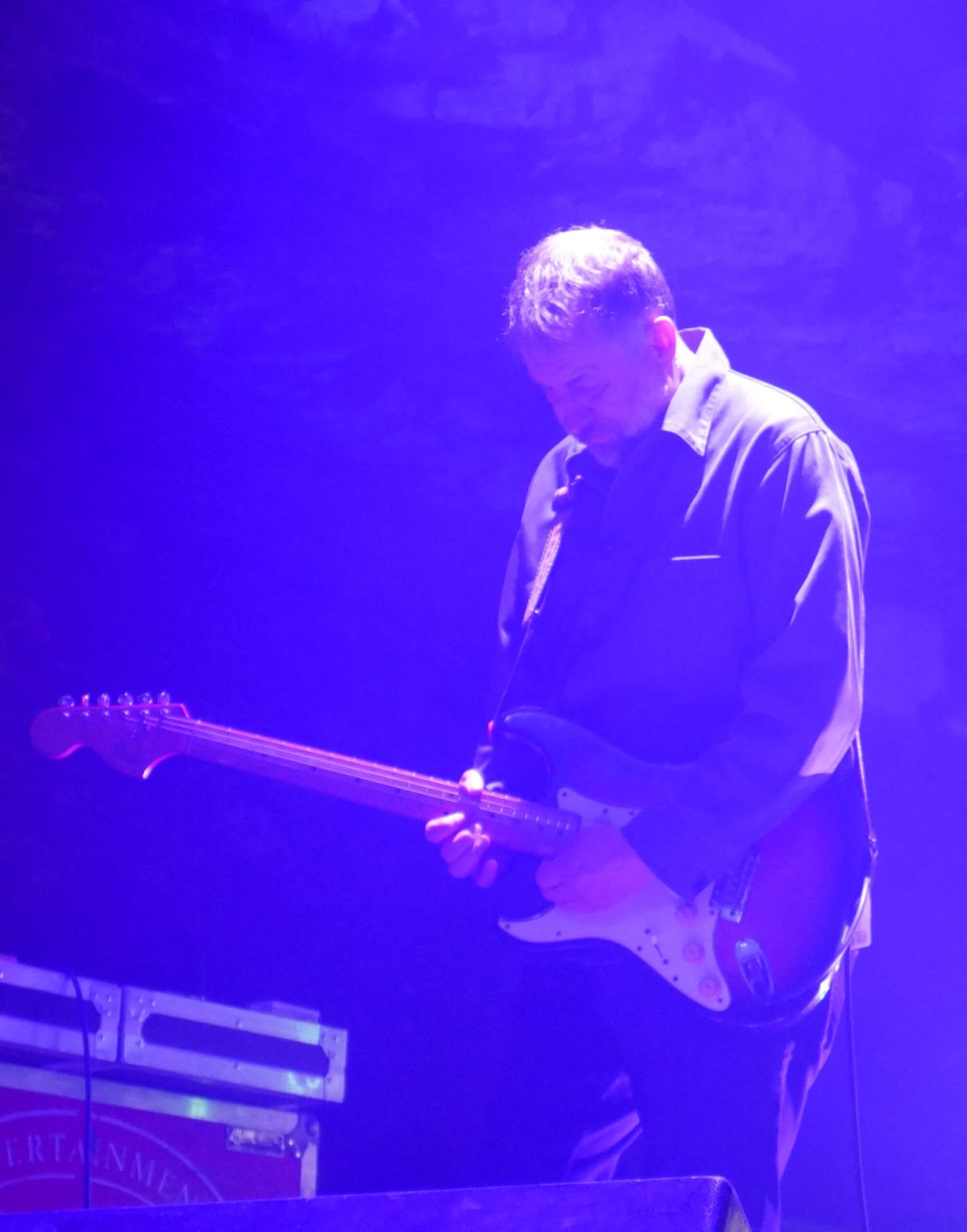 slowdive guitarist savill playing on stage at the caverns